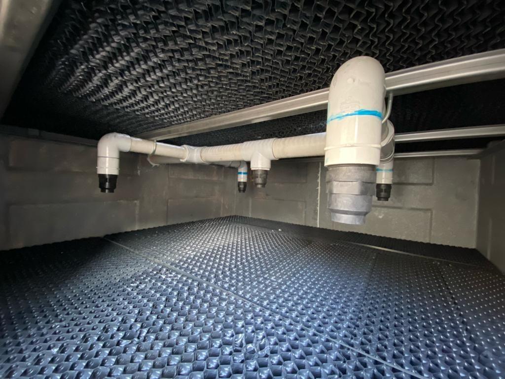 PVC film fill installed inside an industrial cooling tower PVC film fill installed inside an industrial cooling tower